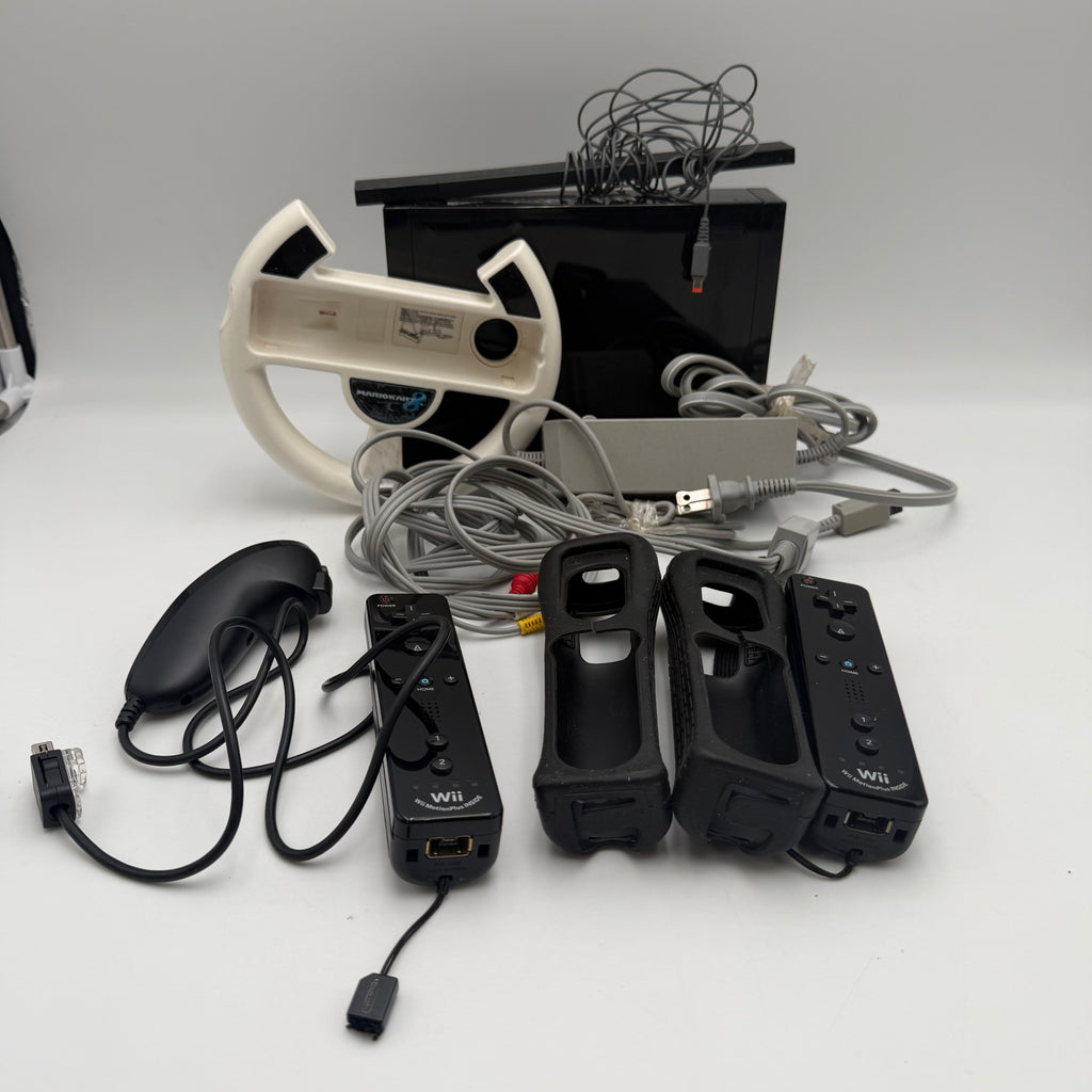 Nintendo Wii Black with 2 controllers + Cables + Wheel