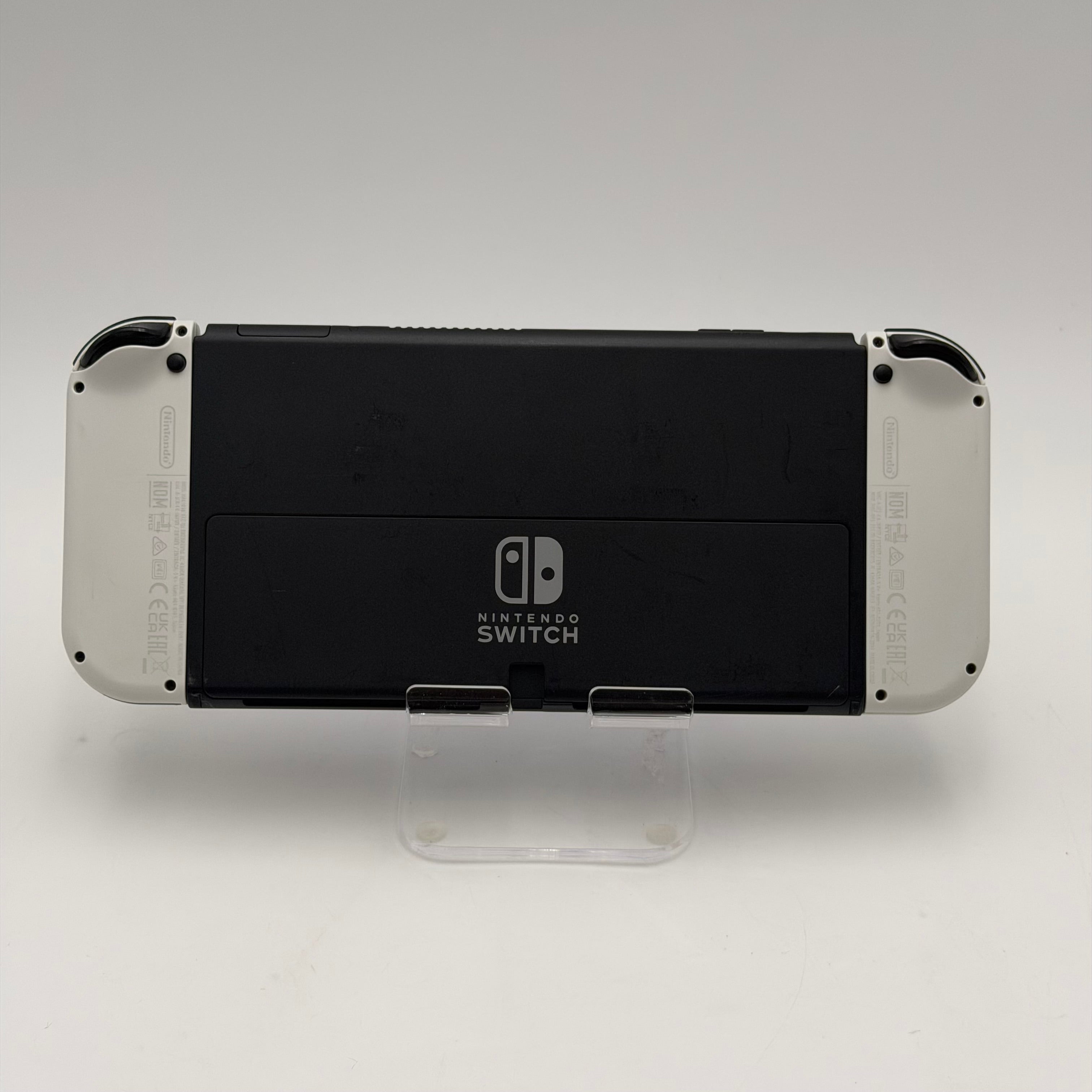Nintendo Switch OLED Model White Joy-Cons plus Powera Nintendo Wireless controller
