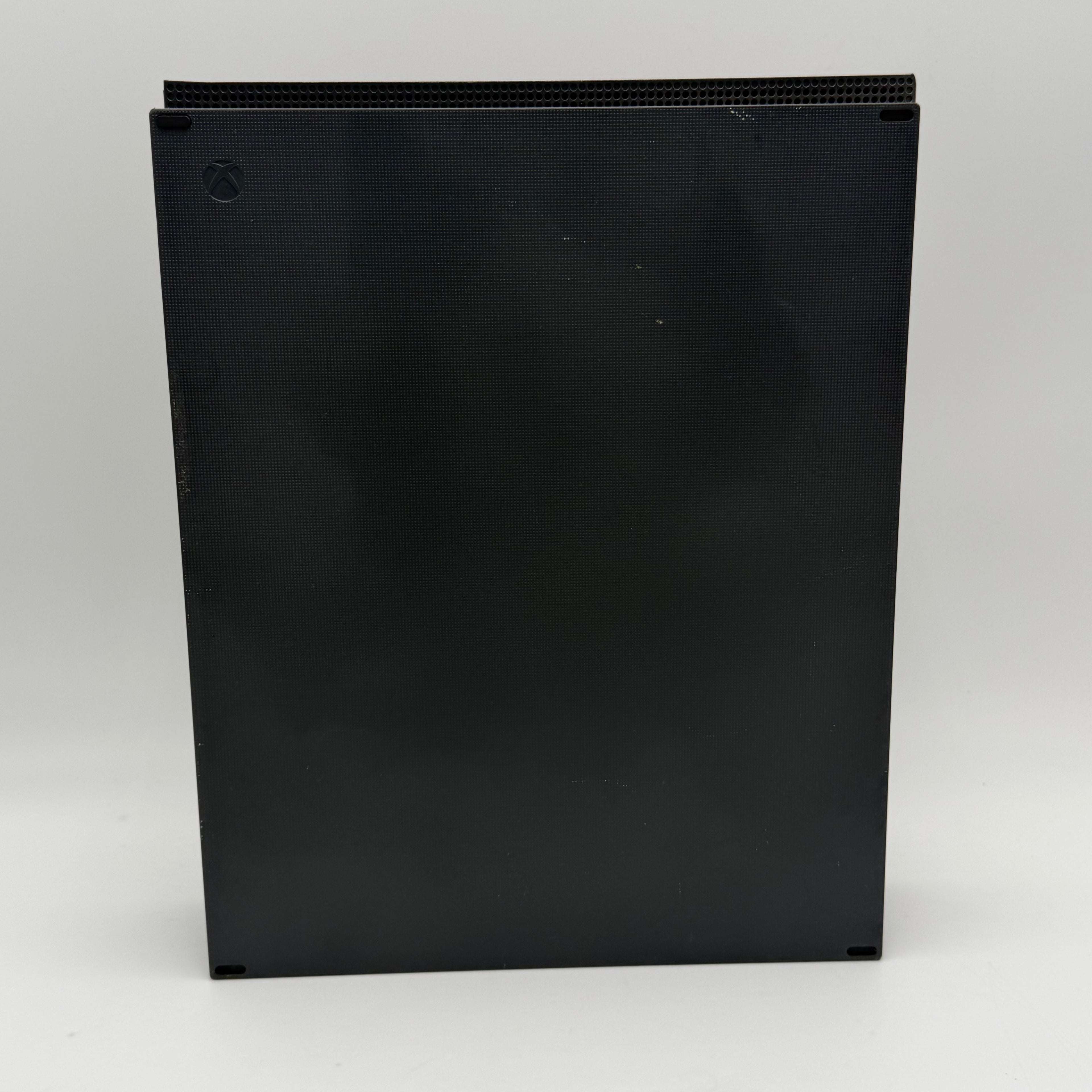 Microsoft Xbox One X with controller