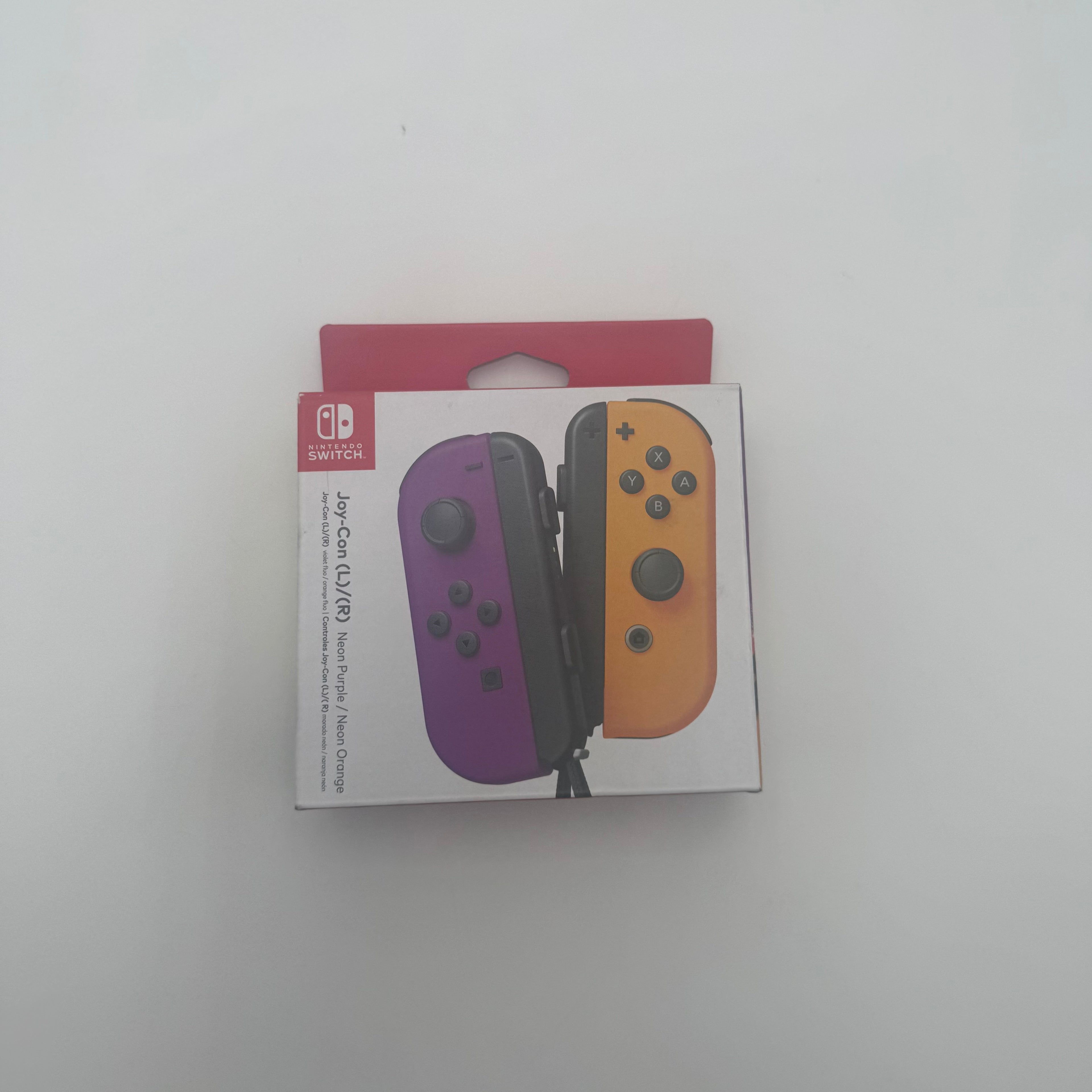 Nintendo Joy-Con Controllers (L/R) for Nintendo Switch - Neon Purple/Neon Orange