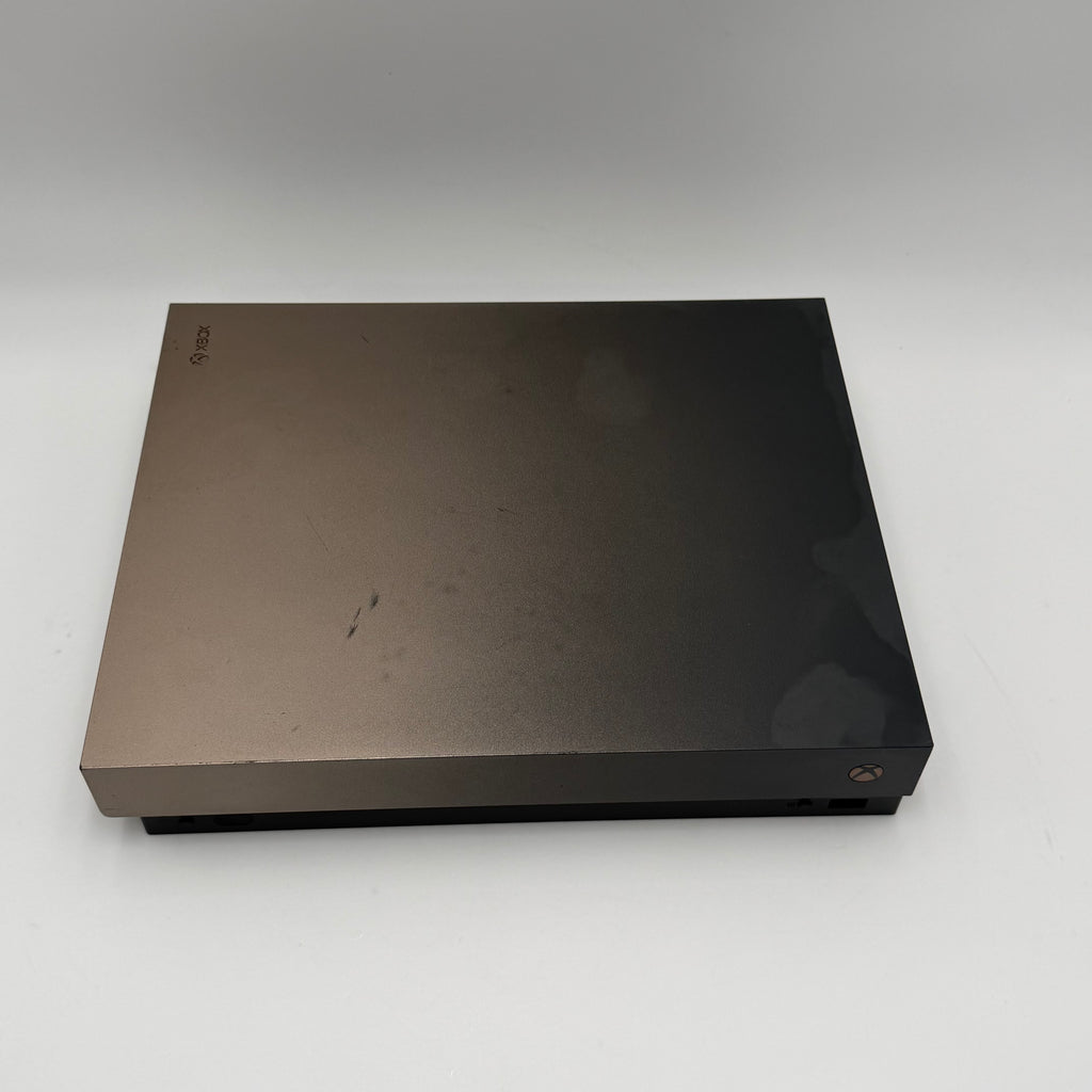 Microsoft Xbox One X with controller