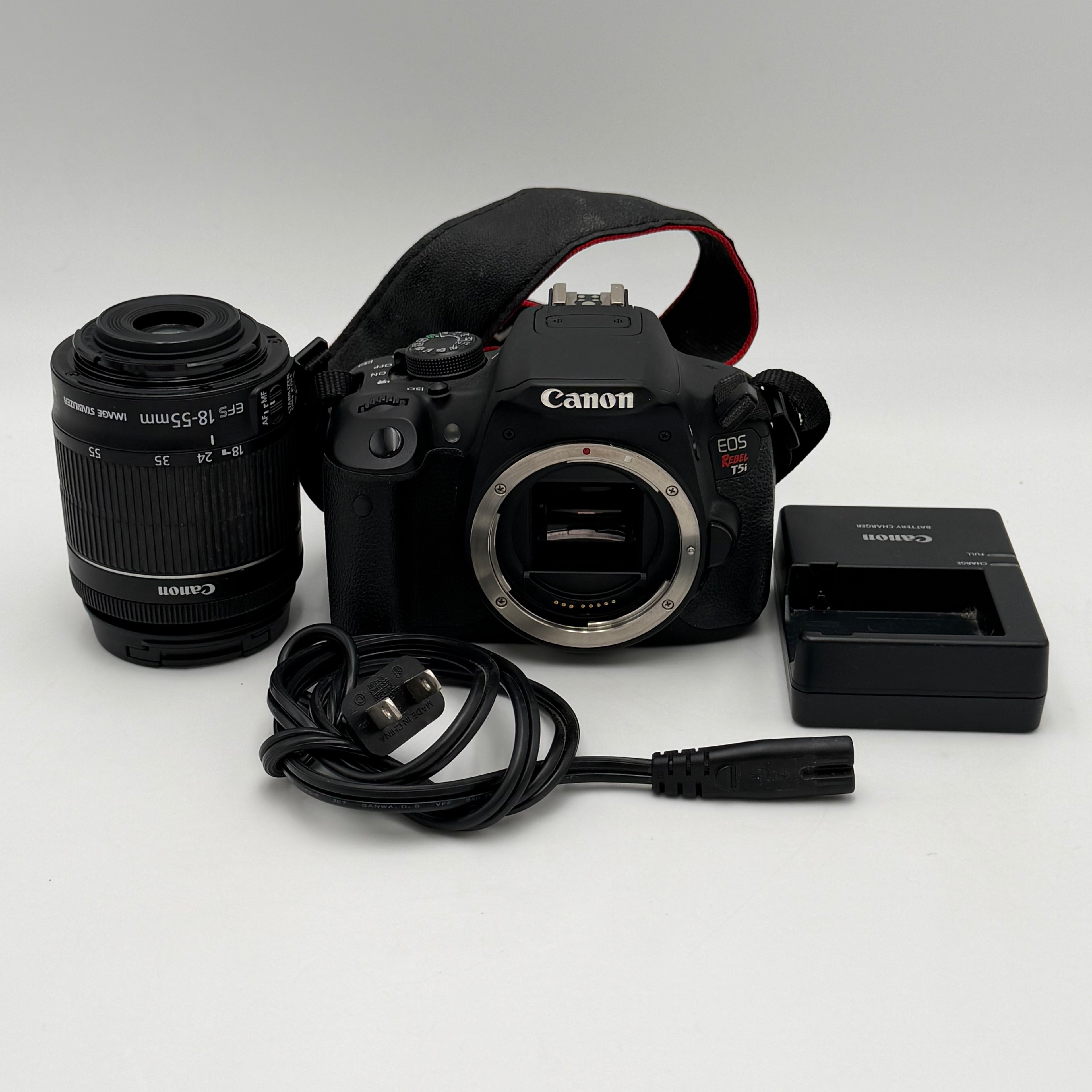 Canon EOS Rebel T5i DSLR Camera, Charger + EF-S 18-55mm Lens