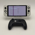 Nintendo Switch OLED Model White Joy-Cons plus Powera Nintendo Wireless controller