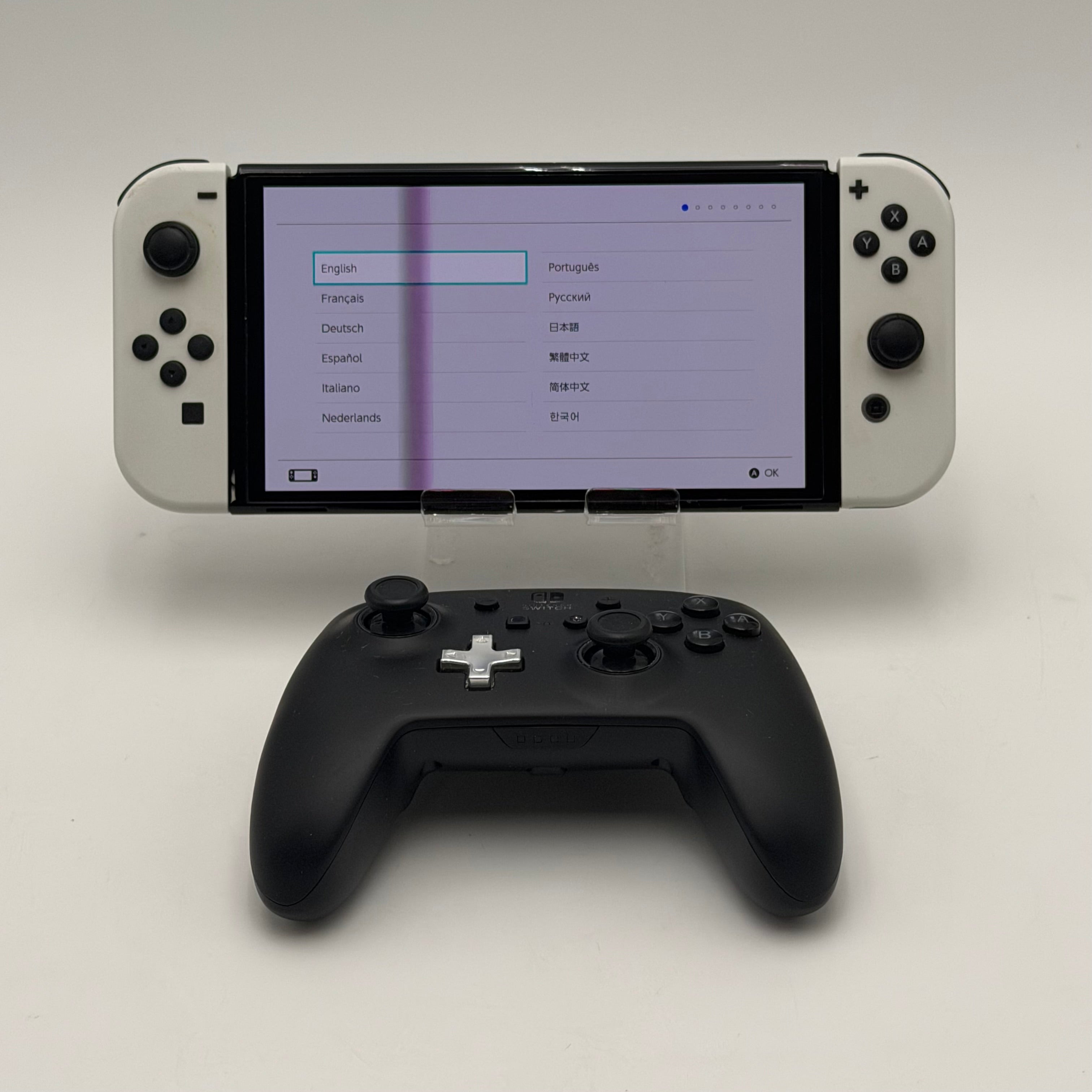 Nintendo Switch OLED Model White Joy-Cons plus Powera Nintendo Wireless controller