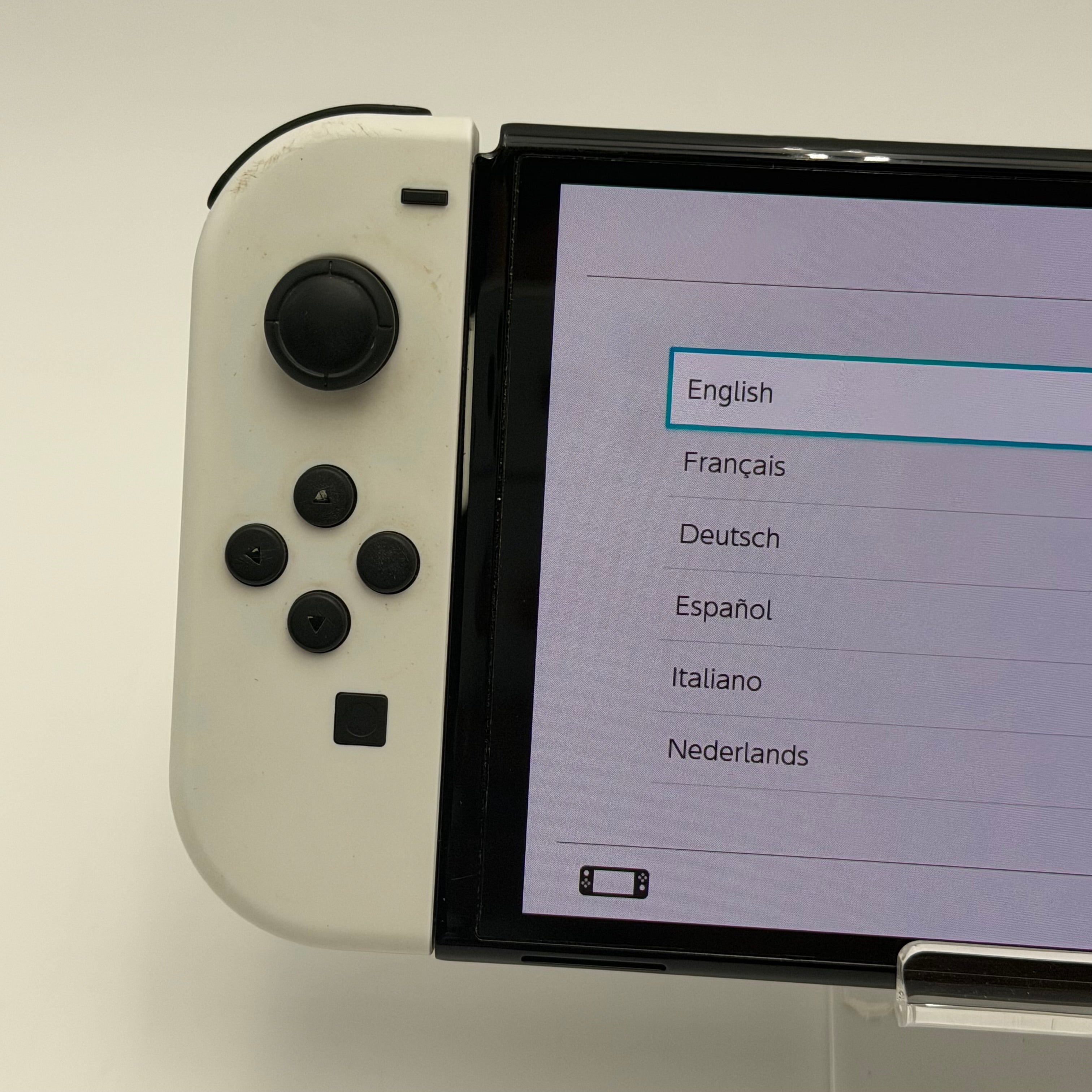 Nintendo Switch OLED Model White Joy-Cons plus Powera Nintendo Wireless controller