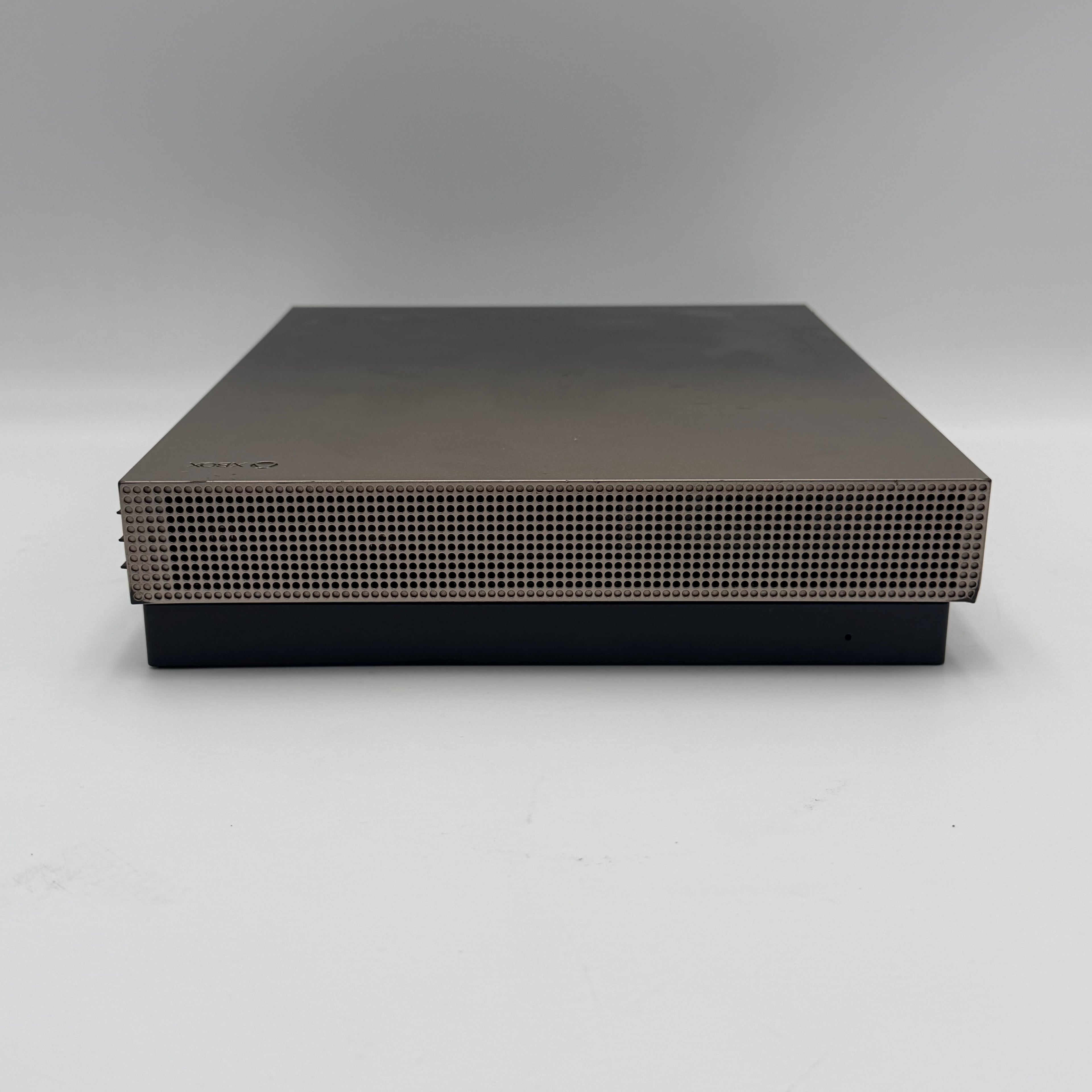 Microsoft Xbox One X with controller